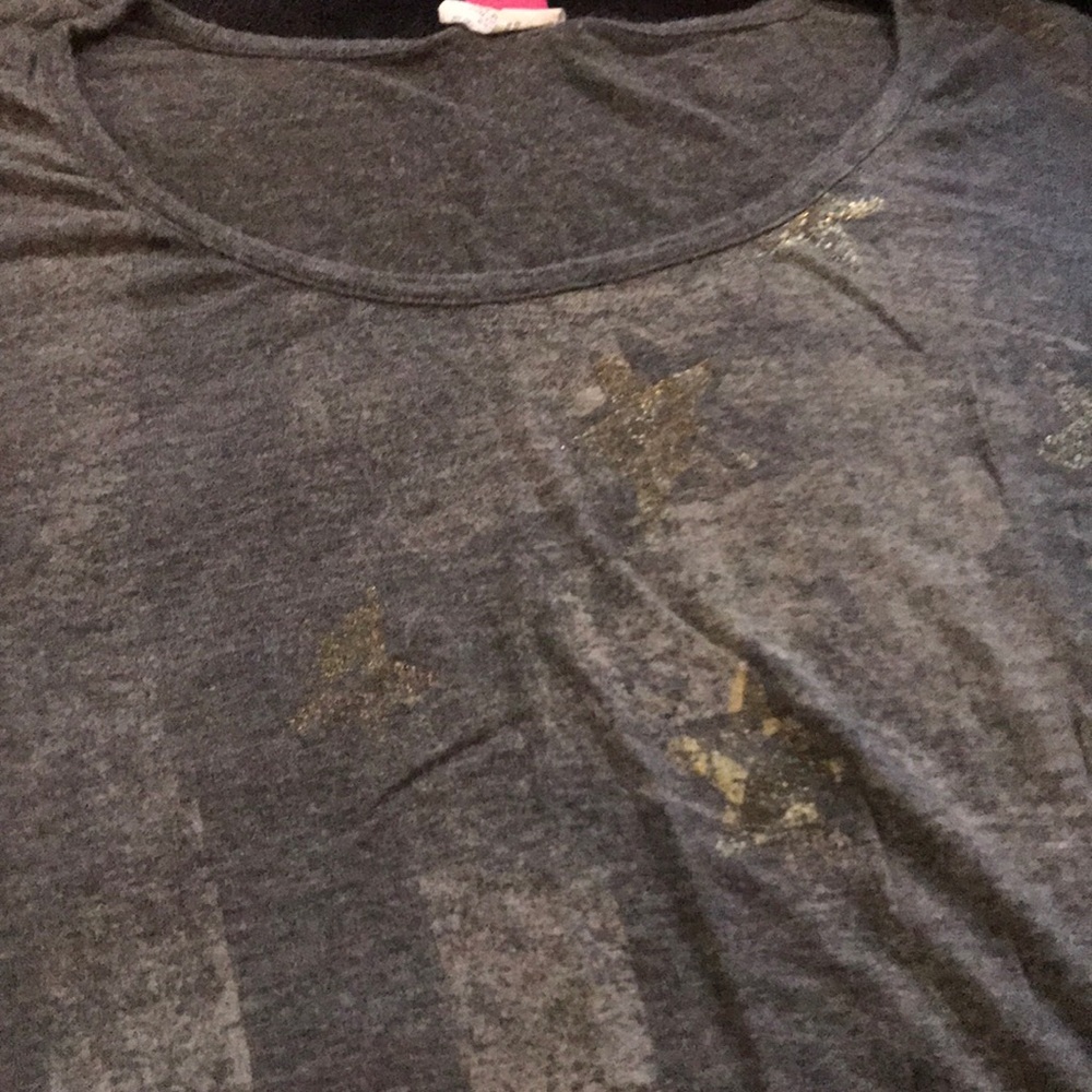 Grey T with white stripes and gold stars ( muted)